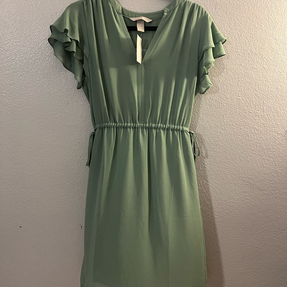 Mint green H&M knee length dress, chiffon size small brand new pick up or meet